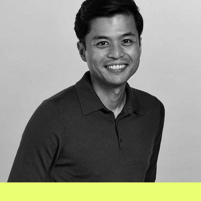 portrait of a male figure wearing a dark polo shirt