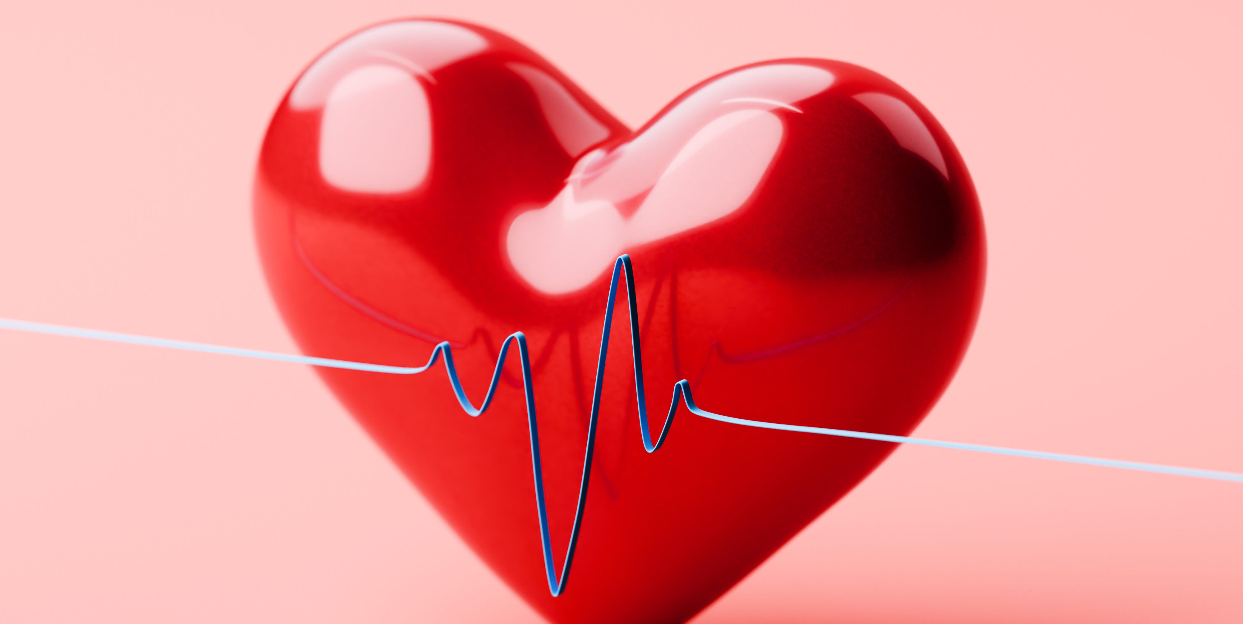 reflective red heart with diagonal ecg line graph