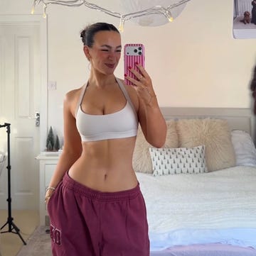 selfportrait featuring a person in a casual outfit in a bedroom setting