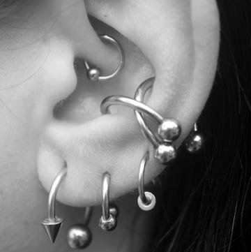ear with many piercings