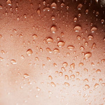 closeup of water droplets on a textured surface
