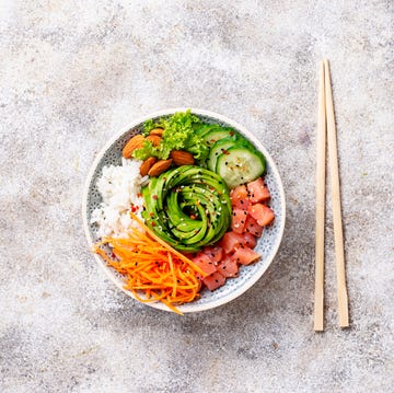 Hawaiian poke bowl with salmon, rice and vegetable