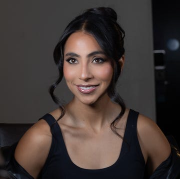 portrait session with a subject sitting in front of a camera