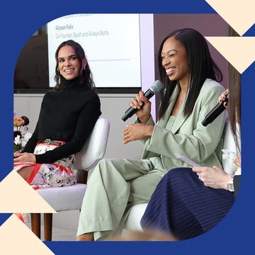 panel discussion with three speakers two seated one speaking