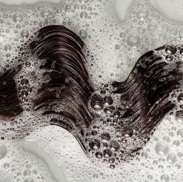 hair submerged in soapy water with bubbles