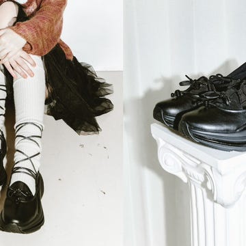 footwear displayed alongside a person sitting