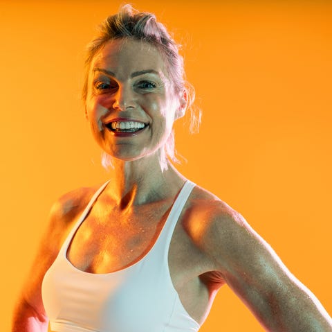 beautiful mature sportive woman wearing sportswear doing workout happy athletic mature woman wearing sportswear