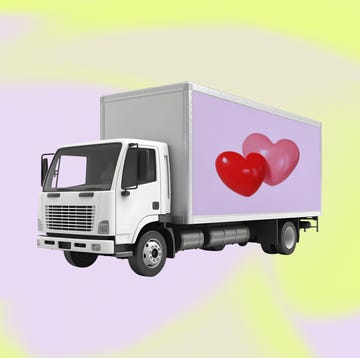 a delivery truck with hearts on its side