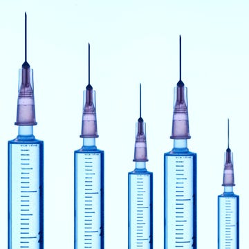 detail  close up of 7 medical syringes, macro photography 