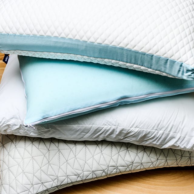 a stack of sleeping pillows