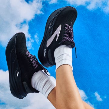 brooks running shoes displayed against a blue sky backdrop