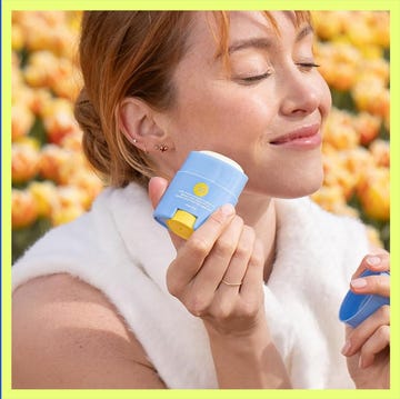 sunscreen product and a person applying it