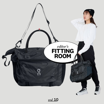 black bag showcased against a neutral background with text overlay indicating a fitting room