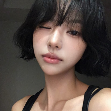 two portraits of a person with short hair in different settings