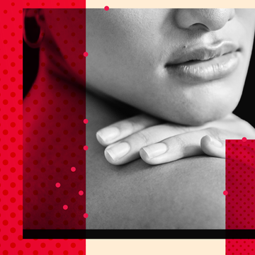 closeup of a womans face and hand resting on her shoulder with patterned red and beige background