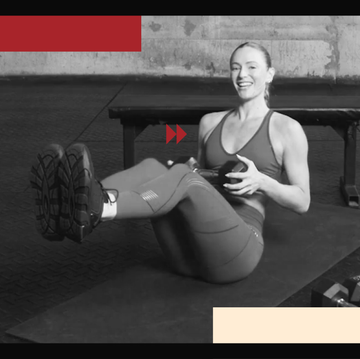 person performing a workout exercise with a dumbbell